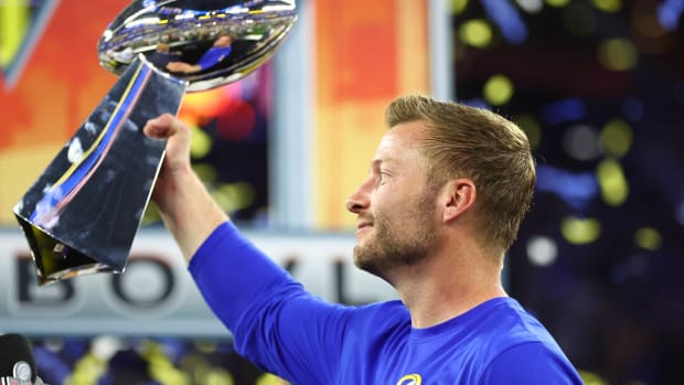 Feb 13, 2022; Inglewood, CA, USA; Los Angeles Rams head coach Sean McVay hoists the Lombardi Trophy after defeating the Cincinnati Bengals in Super Bowl LVI at SoFi Stadium. Mandatory Credit: Mark J. Rebilas-USA TODAY Sports